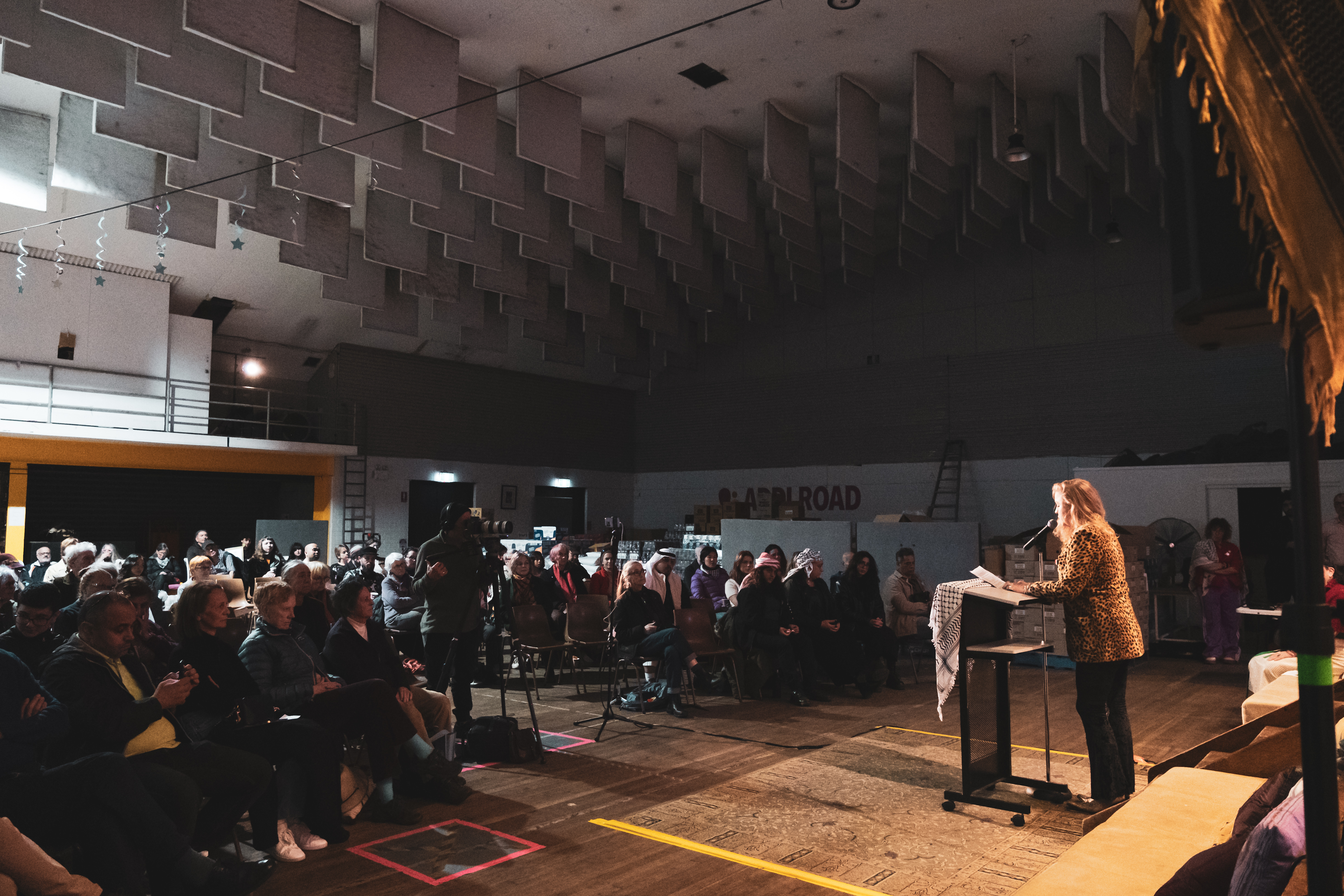 Chloe Charody speaks at the Hearts for Gaza Charity Concert