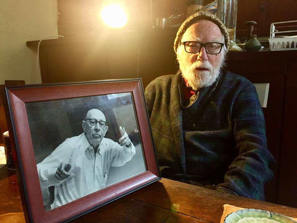 Nigel Butterley (background), with favourite image of Stravinsky (foreground).